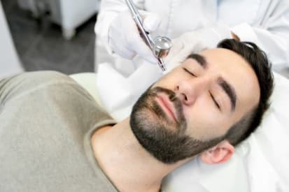 man-getting-oxygen-facial