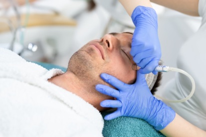 man-getting-microdermabrasion